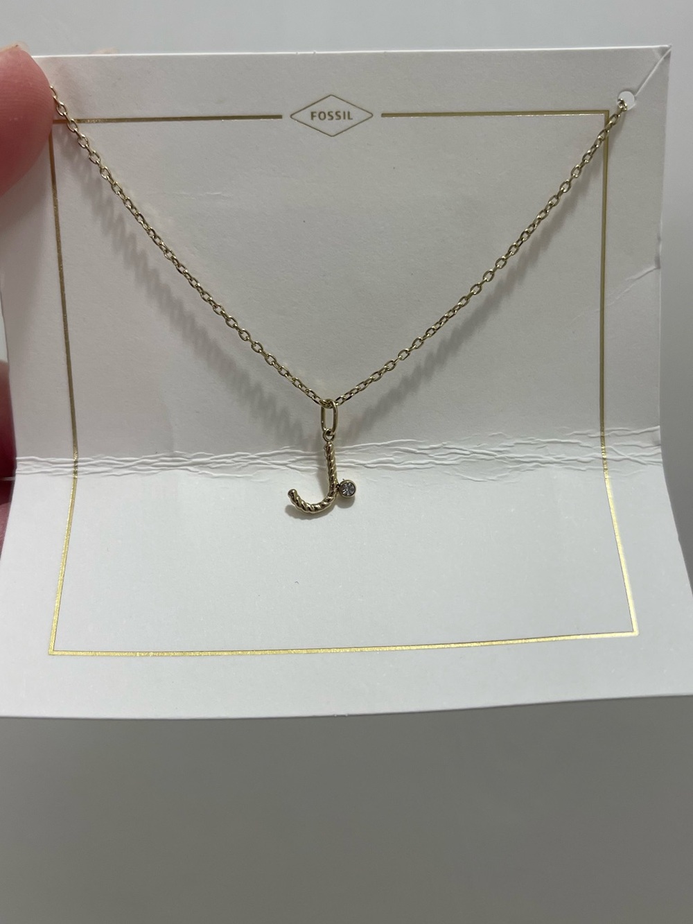 Fossil initial J necklace with Navy Drawstring Pouch and box